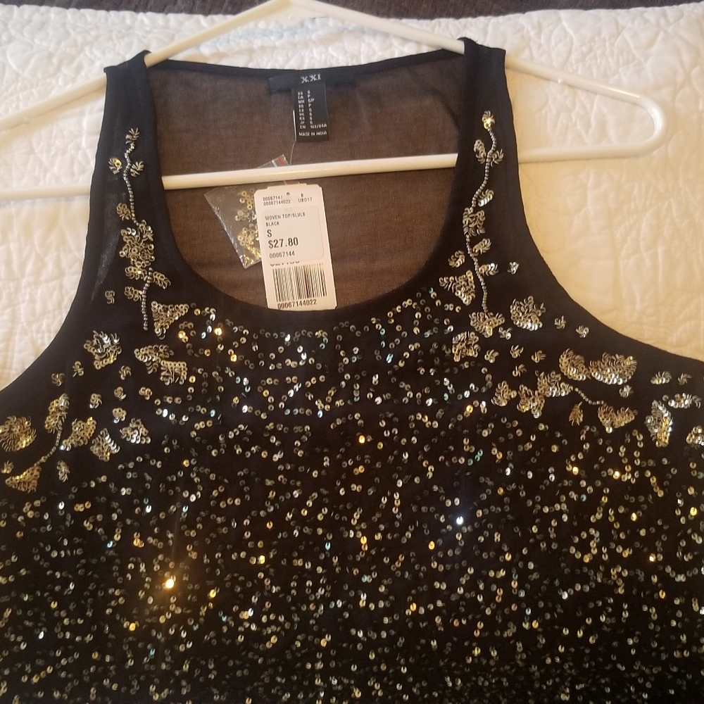 Sequin and sheer sleeveless top